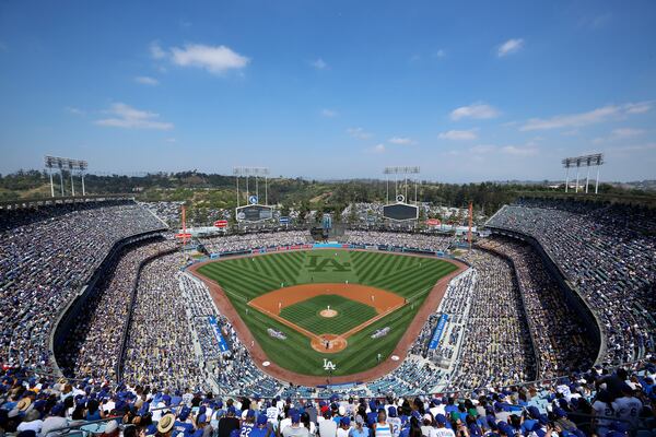 FILE - Dodger Stadium is seen during the first inning of an opening day baseball game between the Los Angeles Dodgers and the San Diego Padres, Monday, April 3, 2017, in Los Angeles. (AP Photo/Ryan Kang, File)
