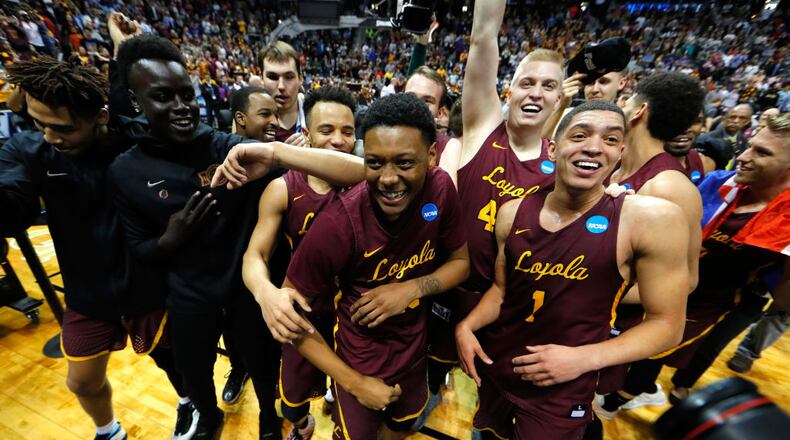 ATLANTA, GA - MARCH 24: The Loyola Ramblers celebrate after defeating the Kansas State Wildcats during the 2018 NCAA Men's Basketball Tournament South Regional at Philips Arena on March 24, 2018 in Atlanta, Georgia. Loyola defeated Kansas State 78-62 to advance to the Final Four. (Photo by Kevin C. Cox/Getty Images)