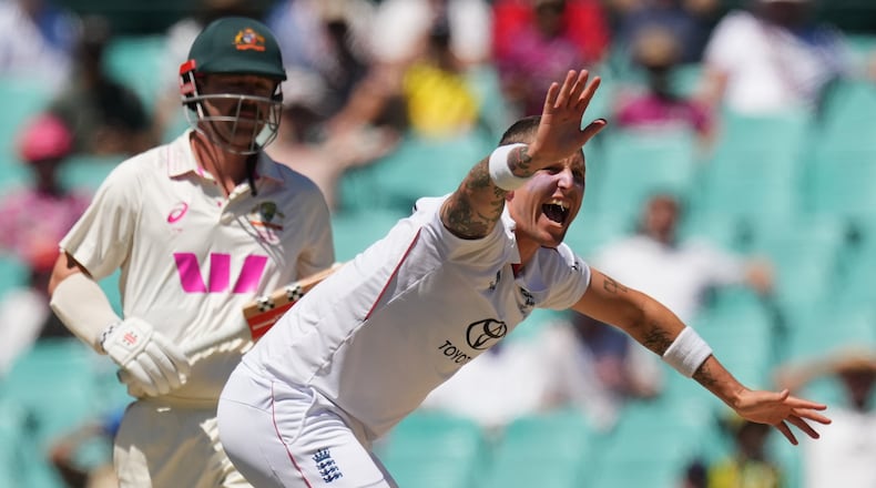 FILE - England's Brydon Carse appeals unsuccessfully for the wicket of Australia's Travis Head during play on the last day of the fifth and final Ashes cricket test between England and Australia in Sydney, Thursday, Jan. 8, 2026. (AP Photo/Mark Baker, File)
