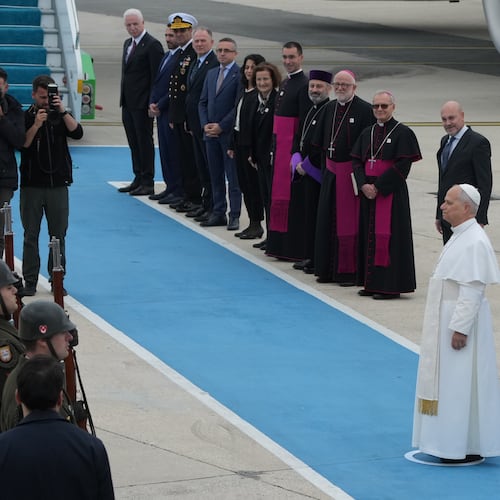 Pope Leo XIV reviews an honor guard during a farewell ceremony before boarding a plane bound to Beirut, Lebanon, at Ataturk airport, in Istanbul, Turkey, Sunday, Nov. 30, 2025. (AP Photo/Dilara Acikgoz)