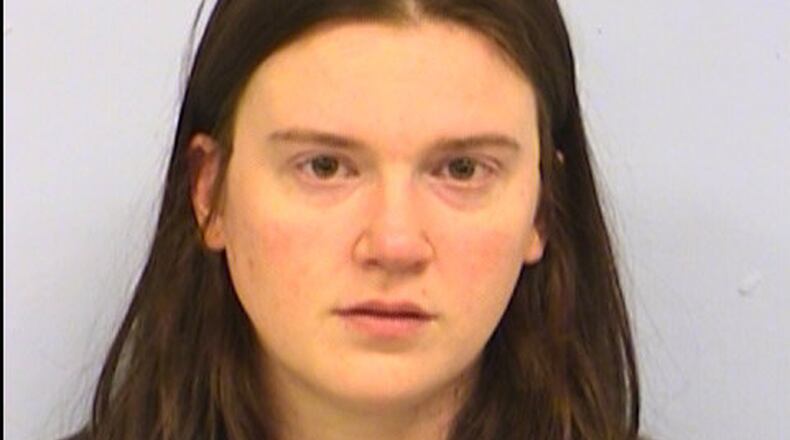 Erin McMurtry, 31, was charged with criminal mischief at a place of worship and was booked into Travis County Jail after she drove through the glass doors of the Church of Scientology of Texas, across the street from the University of Texas, on Dec. 14, 2015.