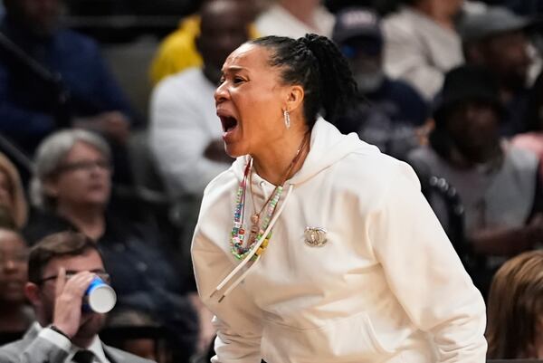 South Carolina head coach Dawn Staley calls out from the bench during the first half against Duke in the Elite Eight of the NCAA college basketball tournament, Sunday, March 30, 2025. in Birmingham, Ala. (AP Photo/Gerald Herbert)