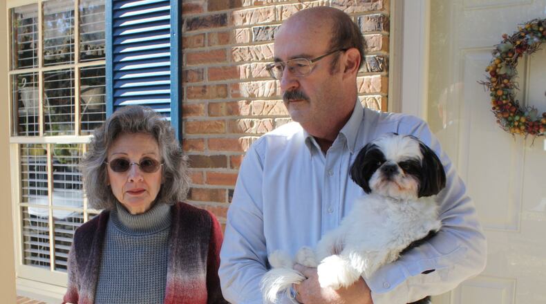 Norcross residents Marella and Dowlen Lloyd are among those concerned about a proposed QuikTrip gas station they believe threatens their modest-but-stable neighborhood right off of Jimmy Carter Boulevard. CHRIS JOYNER / CJOYNER@AJC.COM