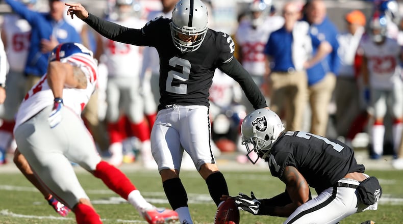 Giorgio Tavecchioof the Oakland Raiders kicks an extra point against the New York Giants during their NFL game at Oakland-Alameda County Coliseum on December 3, 2017 in Oakland, California.  (Photo by Lachlan Cunningham/Getty Images)