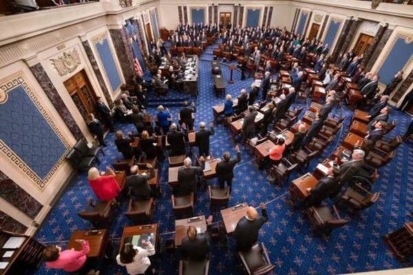 U.S. senators being sworn in ahead of the impeachment trial of President Donald Trump on Thursday. Photograph courtesy of the U.S. Senate.