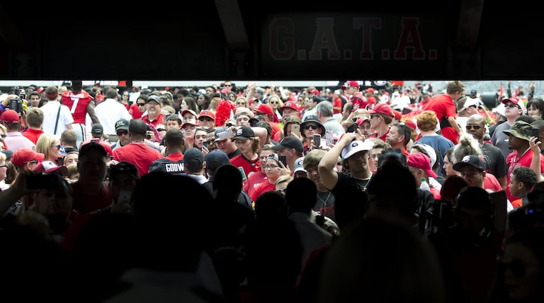 Expect even more Dawg fans to pack Sanford Stadium as the University of Georgia finds itself with higher-than-predicted freshmen enrollment. (AJC File)