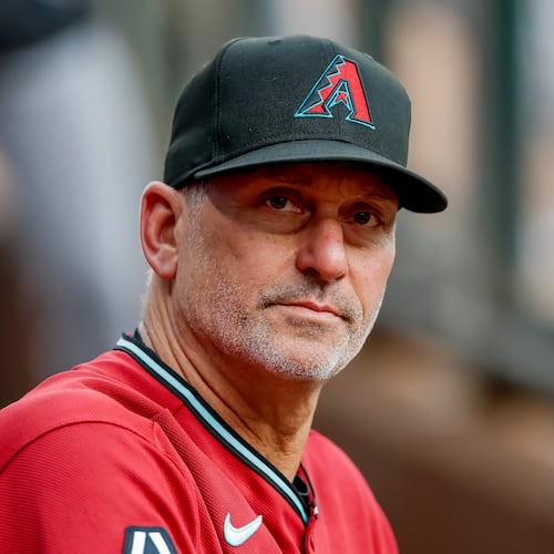 Arizona Diamondbacks manager Torey Lovullo in the dugout before the first pitch of a baseball game against the Atlanta Braves, Saturday, Aug. 15, 2026, in Atlanta. (AP Photo/Erik S. Lesser)