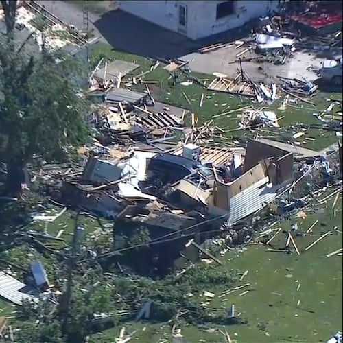 This photo made from video provided by WLS shows an aerial view of storm damage and a tornado-ravaged area on Friday, June 12, 2026, in Merrillville, Ind. (WLS via AP)