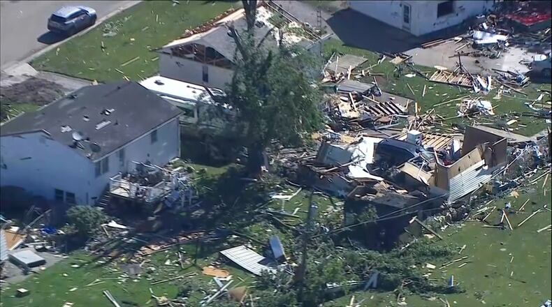 This photo made from video provided by WLS shows an aerial view of storm damage and a tornado-ravaged area on Friday, June 12, 2026, in Merrillville, Ind. (WLS via AP)