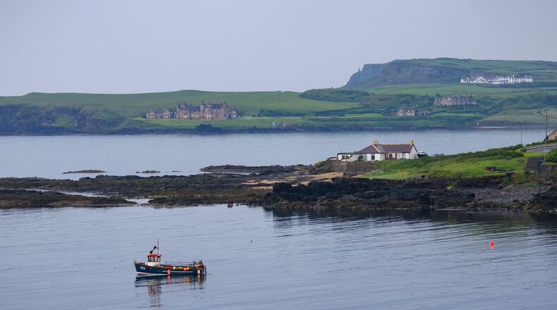 The author is trading Atlanta for this view of Portballintrae, Northern Ireland, as seen from the Giant's Causeway Coast. (Joyce Ferder for the AJC)