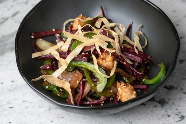 Azara's Okinawan sweet potato stir fry is served in a huge portion that makes for a hearty meal. (Erik Meadows Photography. Courtesy of Azara)