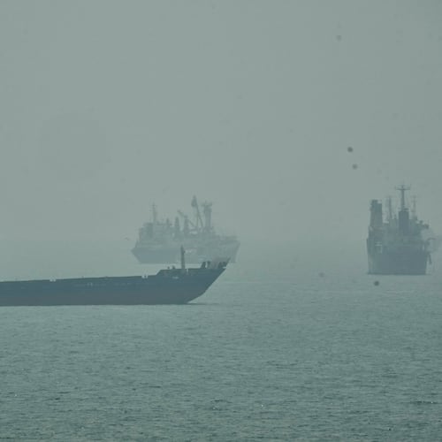 Commercial vessels anchored amid haze in the Strait of Hormuz off Bandar Abbas, Iran, Monday, Sept. 7, 2026. (AP Photo/Vahid Salemi)