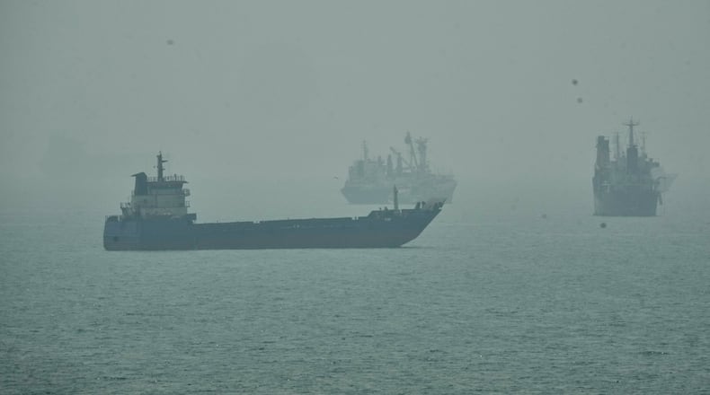 Commercial vessels anchored amid haze in the Strait of Hormuz off Bandar Abbas, Iran, Monday, Sept. 7, 2026. (AP Photo/Vahid Salemi)