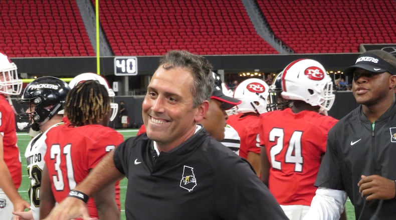 Colquitt County Packers first-year coach Justin Rogers celebrates following their 17-6 win over the North Gwinnett Bulldogs in the 28th Annual Corky Kell Classic on Saturday, Aug. 24, 2019 at Mercedes-Benz Stadium. (Adam Krohn/Special)