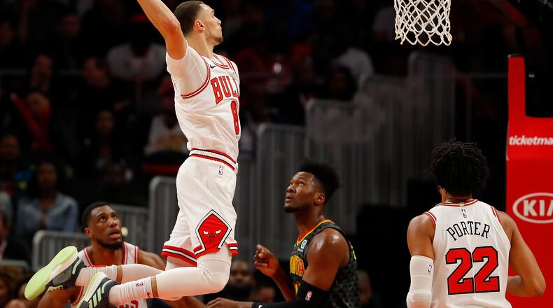 Zach LaVine of the Chicago Bulls dunks against Bruno Fernando of the Atlanta Hawks. (Photo by Kevin C. Cox/Getty Images)
