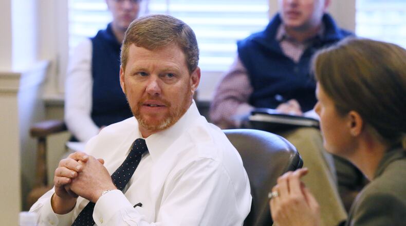 January 16, 2015 - Atlanta - At a budget briefing for media, Deal Chief of Staff Chris Riley (left) and Chief Financial Officer Teresa MacCartney discuss Gov. Nathan Deal’s first state budget of his second term BOB ANDRES / BANDRES@AJC.COM
