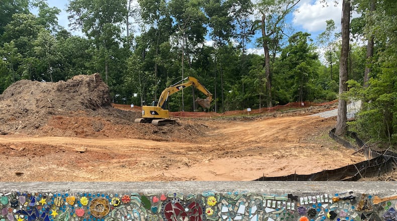 A view of the cleared detention pond on Forest Street in Roswell. City crews cleared  out 50 trees to expand the pond. Credit: Adrianne Murchison