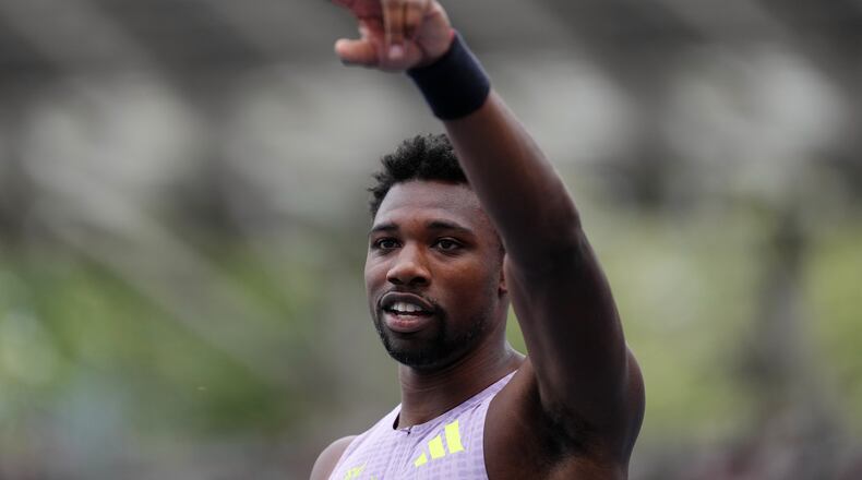 Noah Lyles, of the United States, gestures after finishing second in the men's 100 meters at the Meeting de Paris Diamond League athletics meet in Paris, Sunday, June 28, 2026. (AP Photo/Aurelien Morissard)