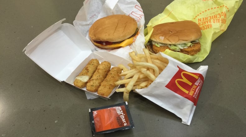 In recent months, metro Atlanta fast-food spots have become crime scenes. (AP Photo/Candice Choi)