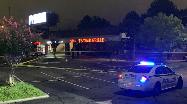 Trayvon Austin, 24, of Decatur, was taken into custody on multiple charges related to the August killing of Kevin Blackwell in the parking lot of Sportstime Bar & Grille, Gwinnett County police said.