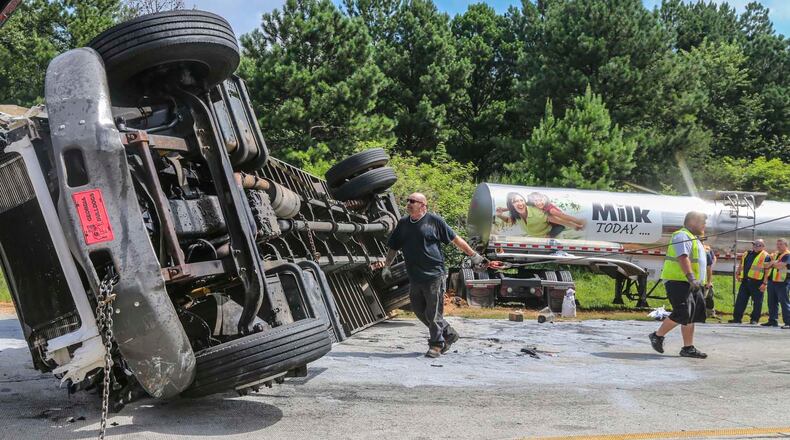 Ga. 316 westbound lanes were shut down near Harbins Road in Gwinnett County after a crash involving multiple trucks and cars on Wednesday, July 12, 2017. JOHN SPINK/JSPINK@AJC.COM.