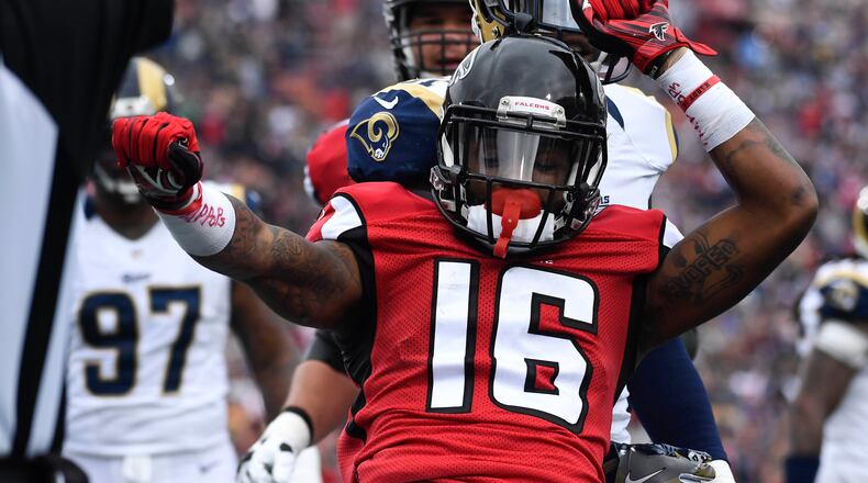 Atlanta Falcons wide receiver Justin Hardy celebrates after scoring during the first half of an NFL football game against the Los Angeles Rams Sunday, Dec. 11, 2016, in Los Angeles. (AP Photo/Mark J. Terrill)