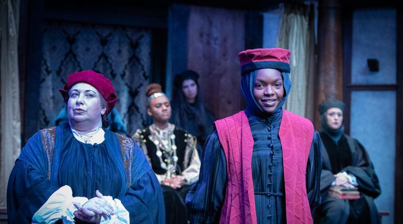 Shylock (Rivka Levin) is outwitted by a costumed Portia (Destiny Freeman), posing as a doctor, during the climactic trial of Atlanta Shakespeare Company's "The Merchant of Venice." (Photos by Jeff Watkins)