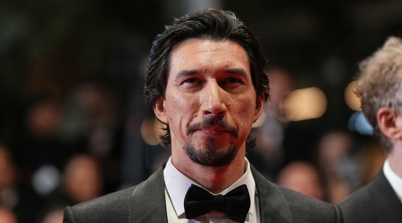 FILE - Adam Driver poses for photographers upon arrival at the premiere of the film 'Paper Tiger' at the 79th international film festival, Cannes, southern France, Saturday, May 16, 2026. (Photo by Scott A Garfitt/Invision/AP, File)