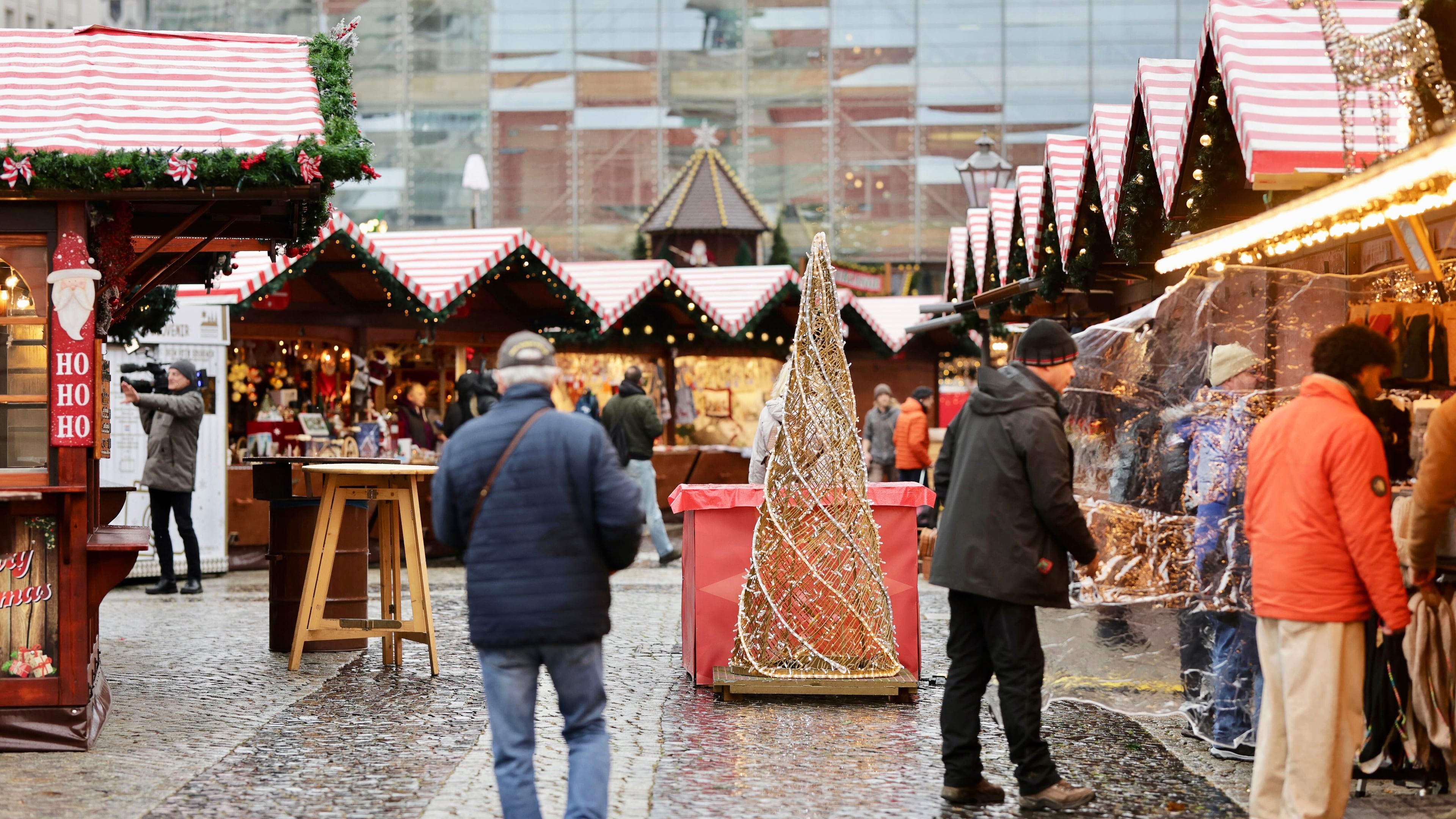 Visitors walk through the Magdeburg Christmas market after the opening in Magdeburg, Germany, Thursday, Nov. 20, 2025. (Matthias Bein/dpa via AP)