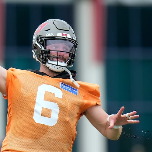 Tampa Bay Buccaneers quarterback Baker Mayfield throws a pass during an NFL football training camp practice Thursday, July 30, 2026, in Tampa, Fla. (AP Photo/Chris O'Meara)