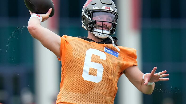 Tampa Bay Buccaneers quarterback Baker Mayfield throws a pass during an NFL football training camp practice Thursday, July 30, 2026, in Tampa, Fla. (AP Photo/Chris O'Meara)