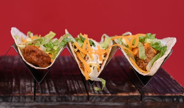 Tacos are among the VIP food offerings available from Proof of the Pudding concessions during Atlanta Dream games at the Gateway Center Arena in College Park. (Natrice Miller for the AJC)