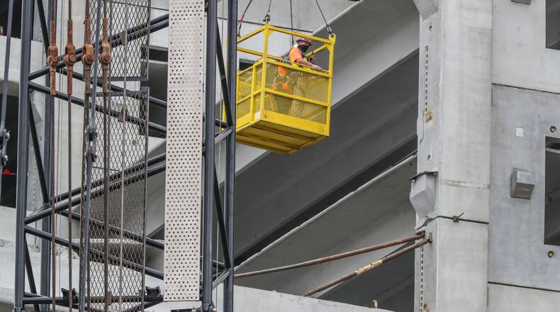 Photo taken September 15, 2020 of construction of the new Emory University Hospital Midtown parking lot. GCP Applied Technologies, which makes additives for cement and concrete, will move its headquarters to Atlanta from Boston. (John Spink / John.Spink@ajc.com)