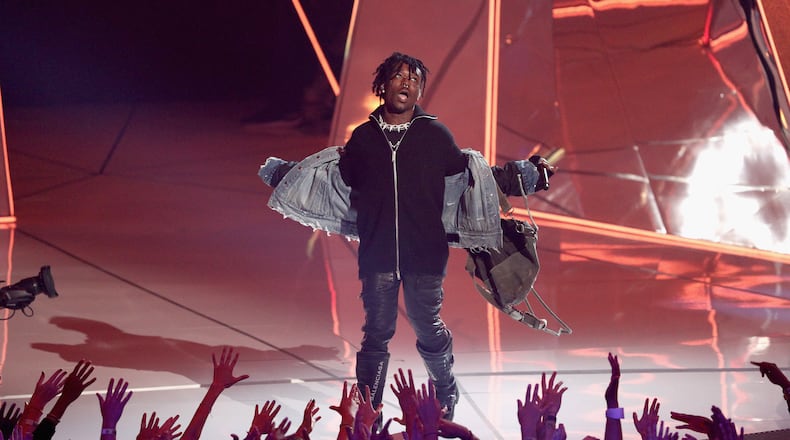 INGLEWOOD, CA - AUGUST 27: Lil Uzi Vert performs onstage during the 2017 MTV Video Music Awards at The Forum on August 27, 2017 in Inglewood, California. (Photo by Frederick M. Brown/Getty Images)