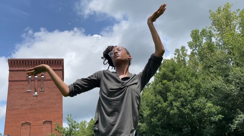 Morgan Hawkins at Whittier Mill Village Park during a performance of "Idle Crimes and Heavy Work."