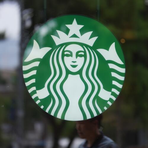 A sign for Starbucks is displayed in Seoul, South Korea, Tuesday, May 26, 2026. (AP Photo/Lee Jin-man)