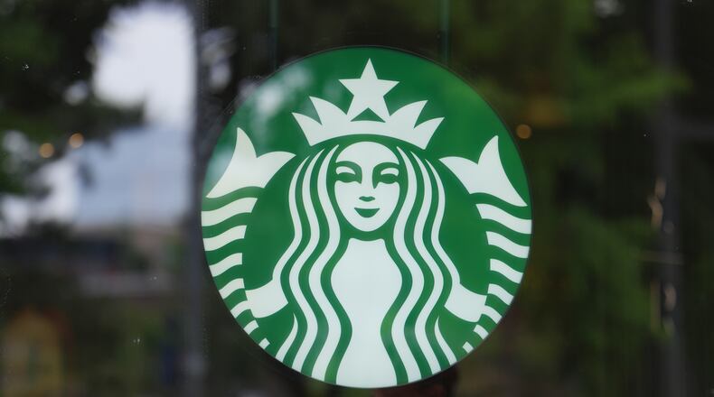 A sign for Starbucks is displayed in Seoul, South Korea, Tuesday, May 26, 2026. (AP Photo/Lee Jin-man)