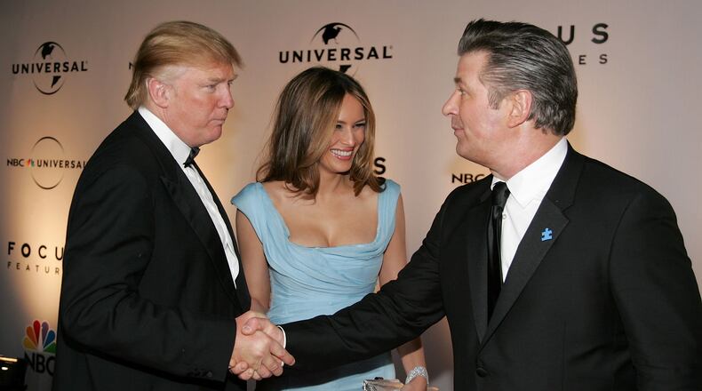 BEVERLY HILLS, CA - JANUARY 15: Donald Trump, wife Melania Trump, and Actor Alec Baldwin (R) arrive at the NBC/Universal Golden Globe After Party held at the Beverly Hilton on January 15, 2007 in Beverly Hills, California. (Photo by Frazer Harrison/Getty Images)