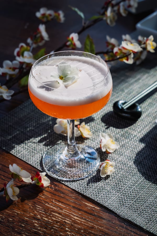 The first sip of Awa Sakura is like a floral cloud scented with cherry blossoms that gives way to the cold, berry-bright flavor beneath. (Courtesy of O-Ku)