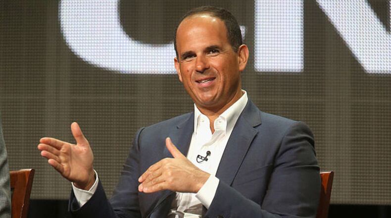 Chicago entrepreneur Marcus Lemonis said fines and possible jail time won't deter him from displaying an American flag, deemed too large by local government, outside his North Carolina RV store.