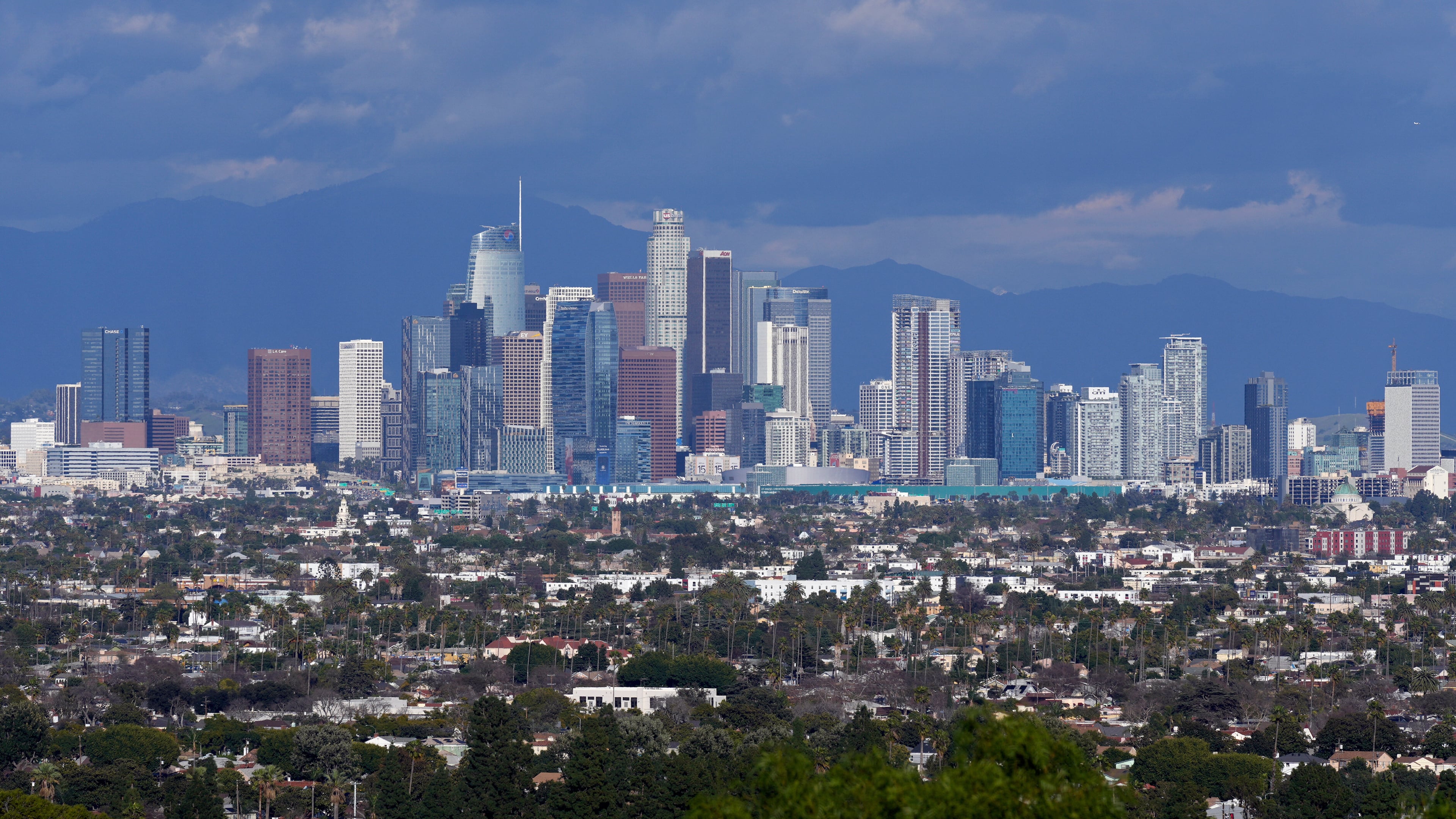 FILE - The Los Angeles skyline is seen from a Baldwin Hills overlook, Feb. 9, 2024. (AP Photo/Damian Dovarganes, File)