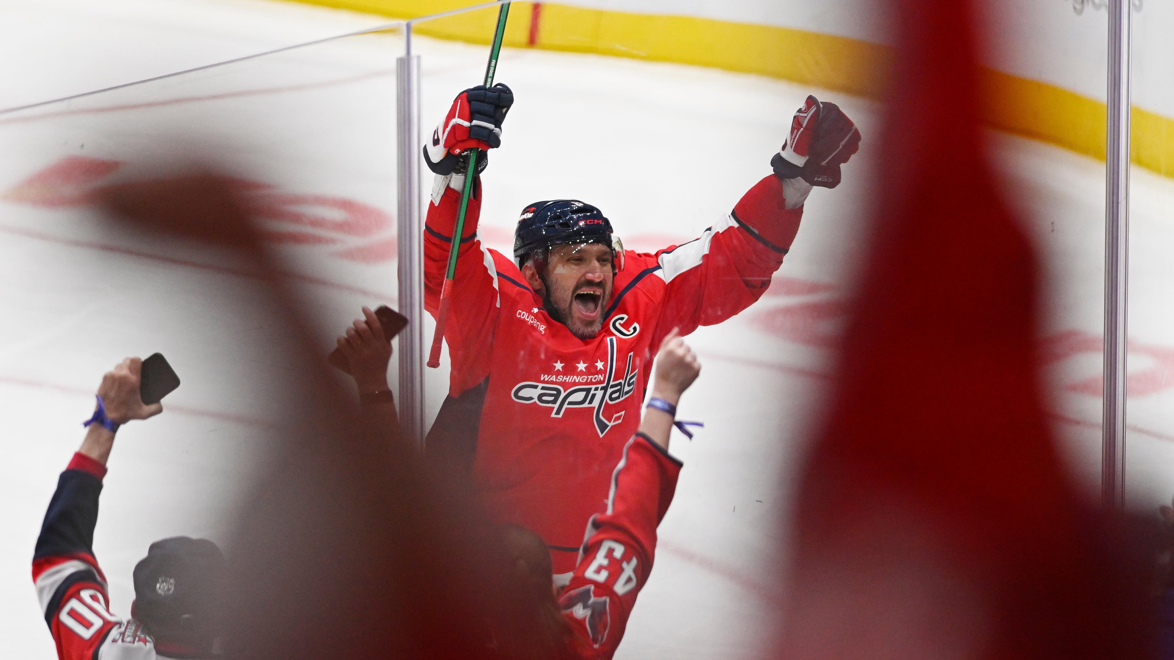 Washington Capitals left wing Alex Ovechkin (8) celebrates his 900th NHL career goal against the St. Louis Blues during the second period of an NHL hockey game, Wednesday, Nov. 5, 2025, in Washington. (AP Photo/John McDonnell)