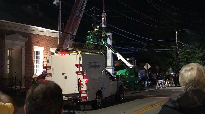 A circa-1913 Confederate monument was dismantled early Wednesday morning in front of the Rockdale County Courthouse in Conyers.
