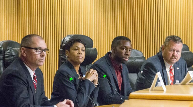 Gwinnett County school board candidates Steve Knudsen (from left), Wandy Taylor (second from left), Everton Blair and Chuck Studebaker participate in a forum at the Gwinnett Justice and Admin Center Auditorium, Tuesday, Oct. 16, 2018. (ALYSSA POINTER/ALYSSA.POINTER@AJC.COM)