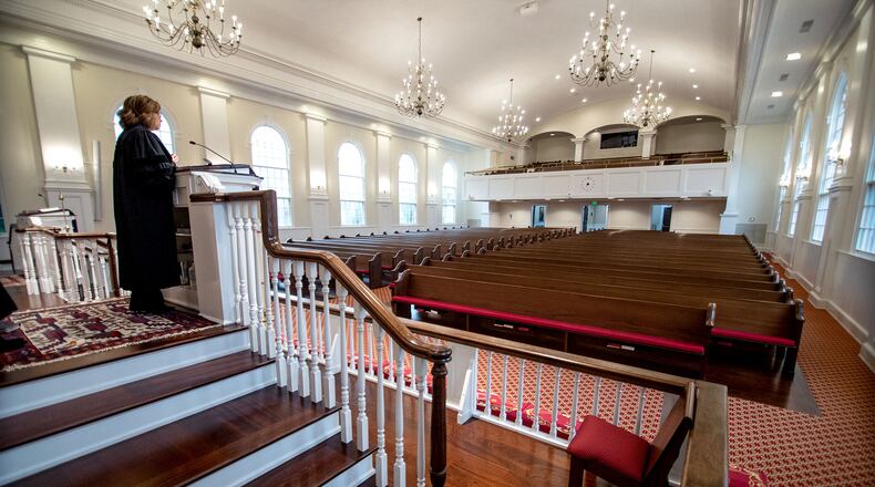 First United Methodist Church of Marietta senior Minister Rev. Dr. Julie Boone talks to her congregation through their Livestream Sunday service on March 15, 2020.  STEVE SCHAEFER / SPECIAL TO THE AJC