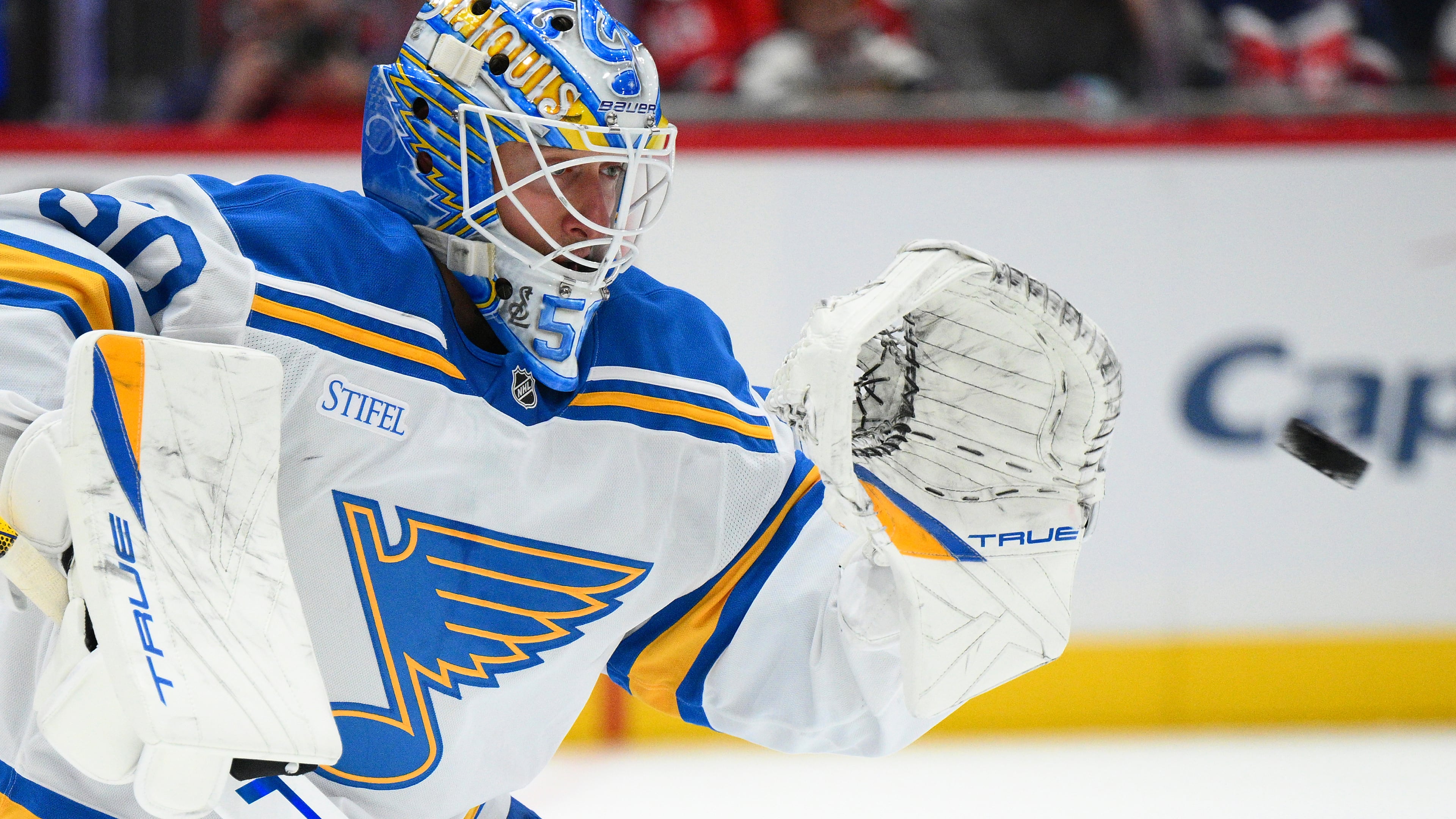 St. Louis Blues goaltender Jordan Binnington (50) stops a puck during the first period of an NHL hockey game against the Washington Capitals, Wednesday, Nov. 5, 2025, in Washington. (AP Photo/Nick Wass)