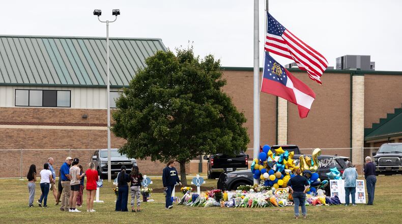 Mourners gather at Apalachee High School on Sept. 6, 2024, in Winder, Georgia. (Arvin Temkar/The Atlanta Journal-Constitution/TNS)