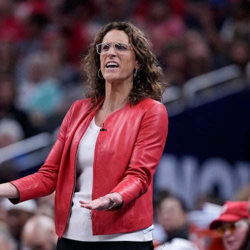 Indiana Fever head coach Stephanie White questions a call in the second half of a WNBA basketball game against the New York Liberty in Indianapolis, Tuesday, Aug. 11, 2026. (AP Photo/Michael Conroy)