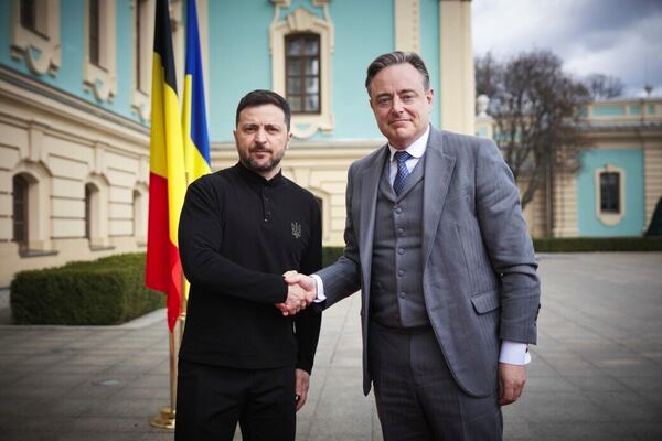 In this photo provided by the Ukrainian Presidential Press Office, Ukrainian President Volodymyr Zelenskyy, left, shakes hands with Belgium's Prime Minister Bart de Wever in Kyiv, Ukraine, Tuesday, April 8, 2025. (Ukrainian Presidential Press Office via AP)