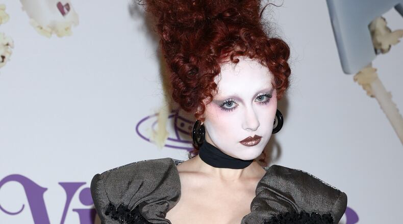 Chappell Roan poses for photographers at the photo call for the Vivienne Westwood Fall/Winter 2026-2027 Women's collection presented in Paris, Saturday, March 7, 2026. (AP Photo/Tom Nicholson)